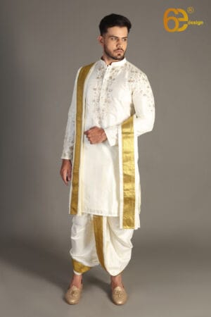 groom in a mandap pattu set with matching loafers