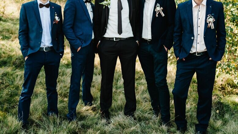 guys in bold wedding suit colors