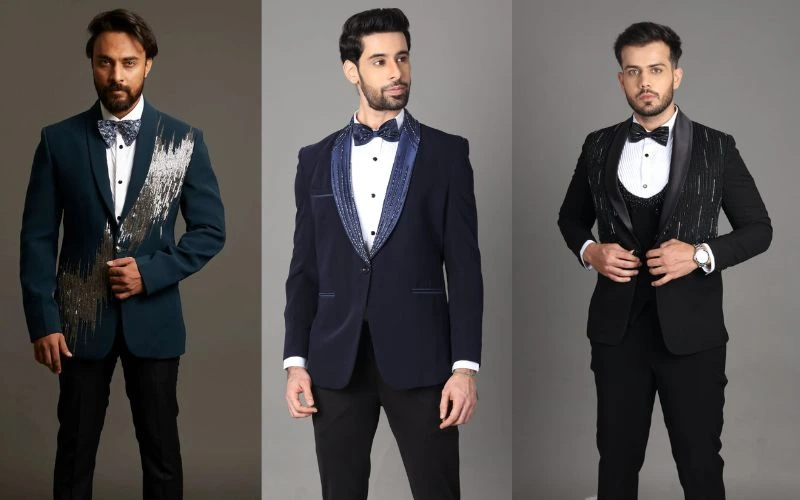Elegant display of three men modeling different styles of formal suits, emphasizing the importance of fit and design in ensuring a wedding suit fits perfectly. The image showcases various suit styles, including a dark teal suit with silver embellishment, a dark navy suit with a shimmering lapel, and a black suit with a subtle pinstripe pattern.